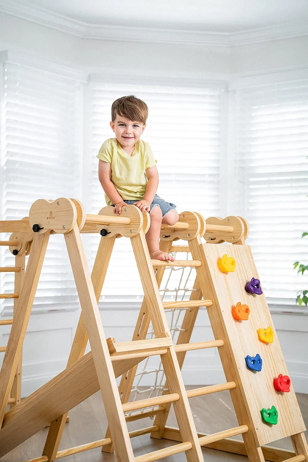 Avenlur 7-in-1 Indoor Playset for Kids 2-6 with Slide, Climbing Wall, Ladder, Net, Bars, Swing, Ring - USA